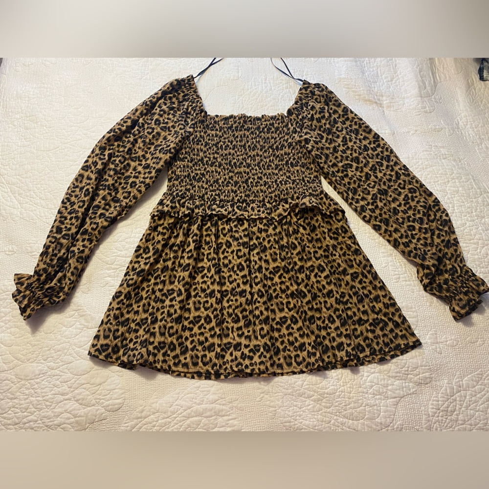 Mini dress from Giddy Up Glamour, it’s a size M, it’s a leopard print